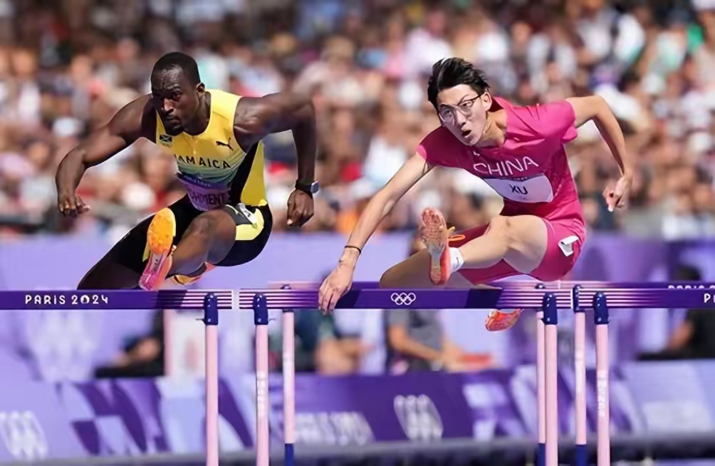 包含古巴运动员在田径比赛中勇夺头名的词条